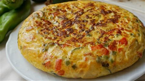 Tortillas rellenas de verduras y queso fundido