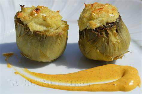Plato de alcachofas confitadas con brandada de bacalao