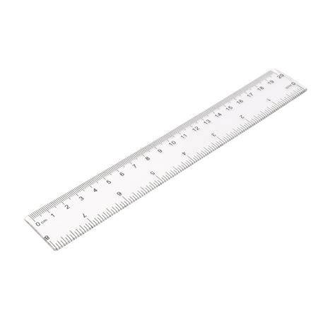 regla de plástico transparente de 40 cm sobre un plano de trabajo