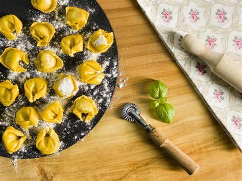 Pasta rellena de espinacas y ricotta