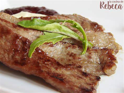 Presa ibérica dorada en plancha