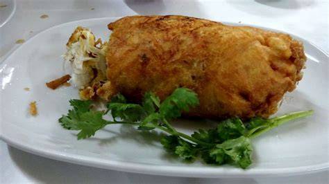 Jay Fai cocinando tortilla de cangrejo