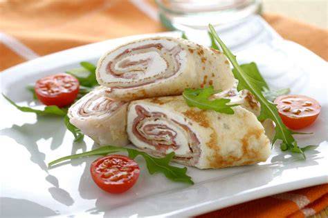 Crepes rellenos de jamón y queso