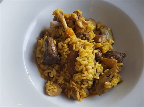 Plato final de arroz meloso de pato y alcachofa