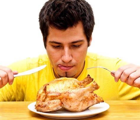 Personas comiendo pollo frito en un sueño