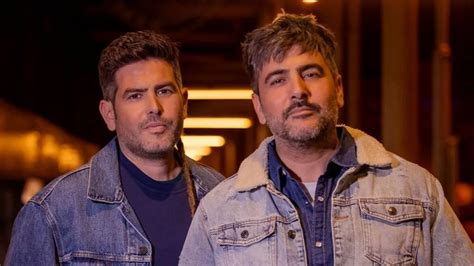 Los hermanos David y José Muñoz de Estopa durante un concierto