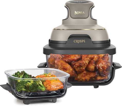 Freidora de aire Ninja CRISPi con recipiente de cristal mostrando pollo cocinándose
