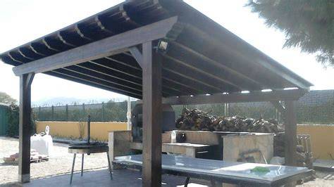 Pérgola de forja con barbacoa
