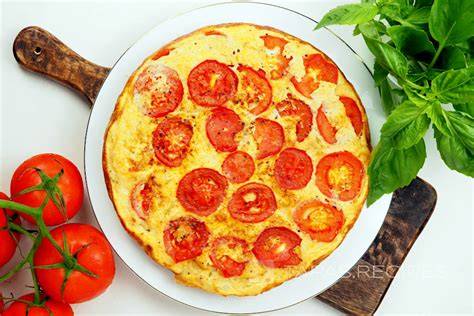 Tortilla de calabacín y tomate en un plato