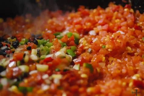 Proceso de preparación del sofrito para paella