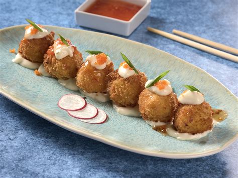 Croquetas de pescado con salsa de mejillones