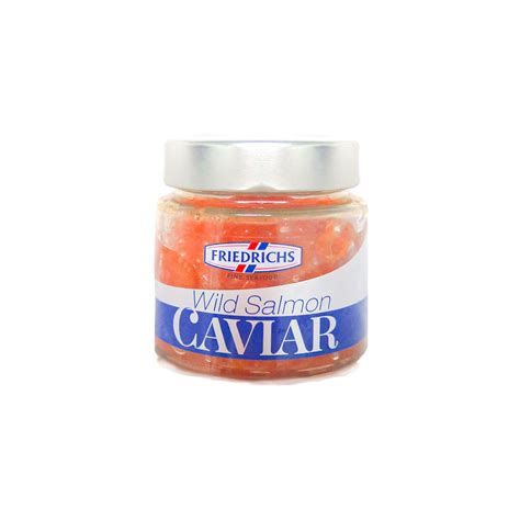 primer plano de huevas de salmón frescas con textura brillante