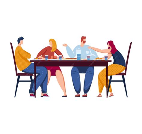 Dos personas cenando en una mesa con una paella