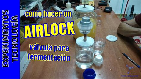 Esquema de un airlock para fermentación