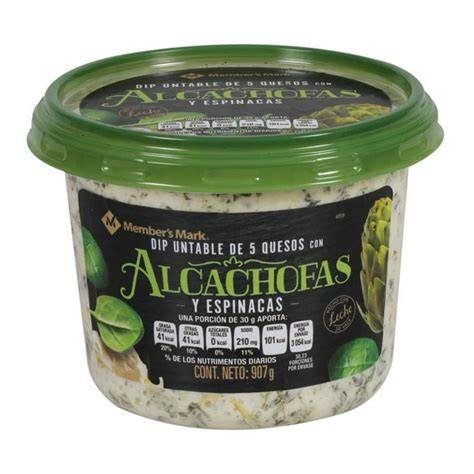 Imagen de un dip de alcachofas servido con crackers