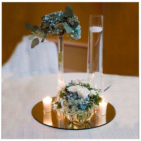 Centro de mesa con base de espejo