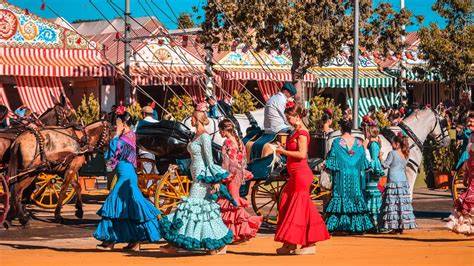 Feria de Abril en Sevilla con trajes de lunares