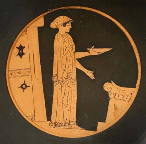 Kylix con una mujer jugando (Grecia, Atenas, c. 500 a. C.)