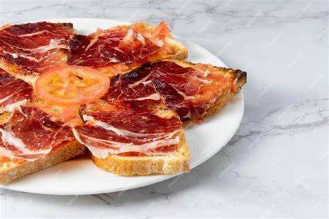 Tostadas de jamón ibérico con tomate