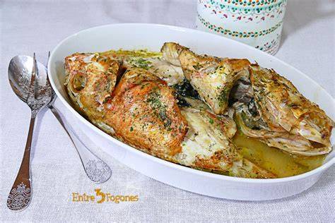 Cabracho al horno con patatas y tomates cherry