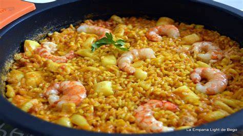 Salteando la sepia en la paella