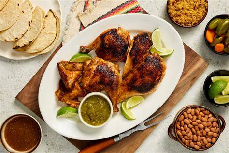 Pollo asado con guarniciones