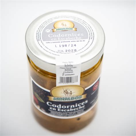 Codornices en escabeche en un tarro de cristal