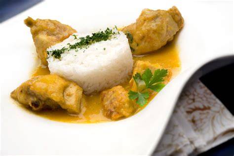 Merluza al curry con arroz basmati