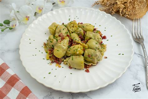 Spaghettini con alcachofas y setas de cardo emplatado