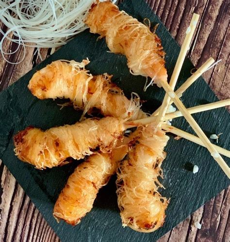 Langostinos rebozados en fideos de arroz