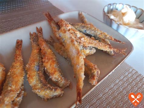 boquerones cocinados en airfryer sobre una rejilla